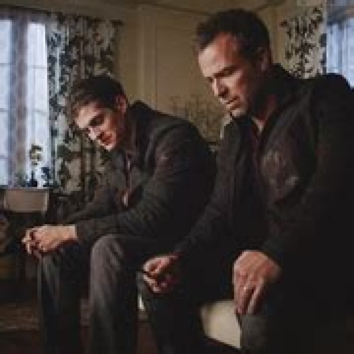 chris argent and isaac sitting next to each other on teen wolf