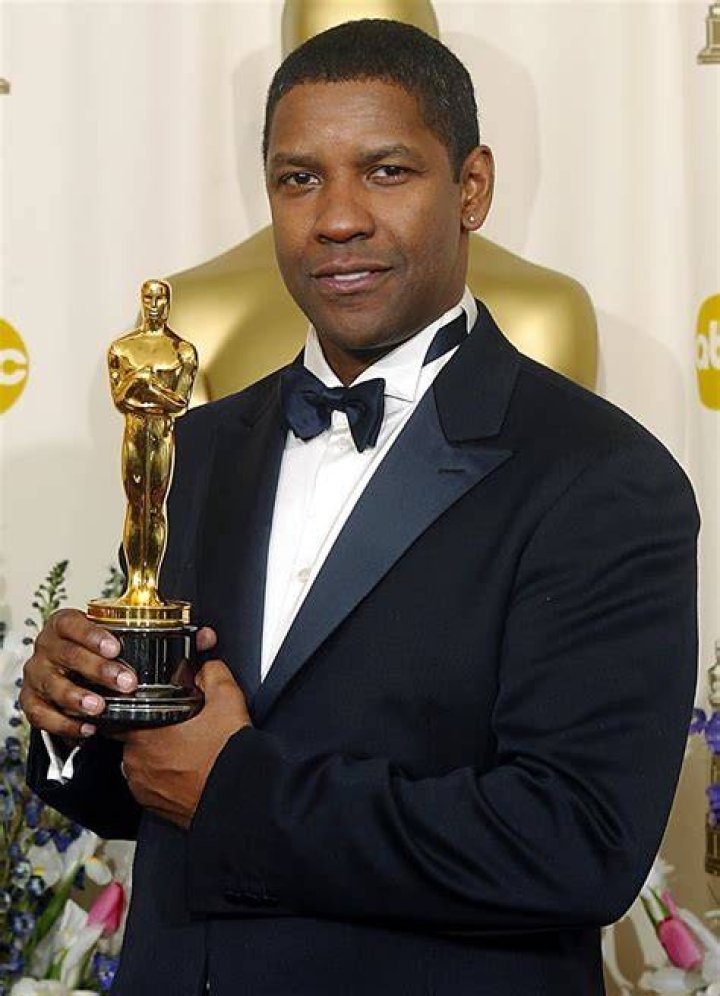 Denzel Washington is holding a knife near a fireplace in The Equalizer 3.