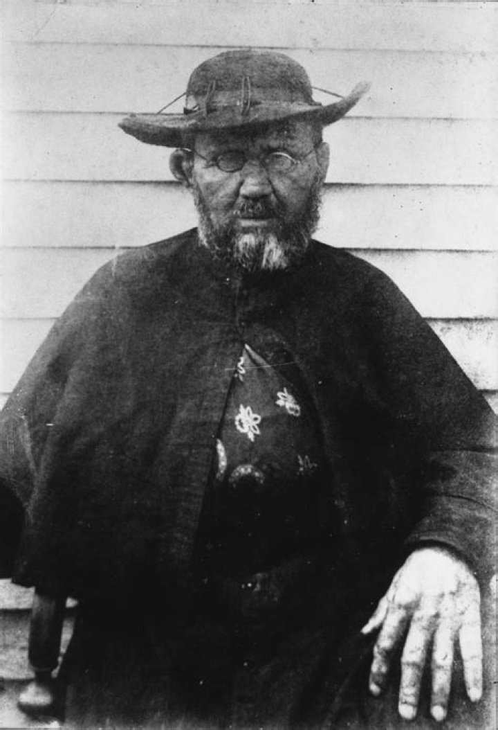 Father Damien Biography