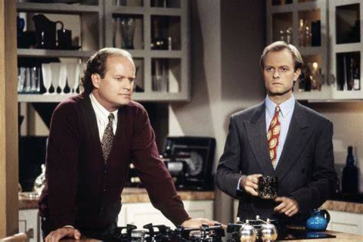 Frasier Crane (Kelsey Grammer) is uniwttingly surrounded by zombies.