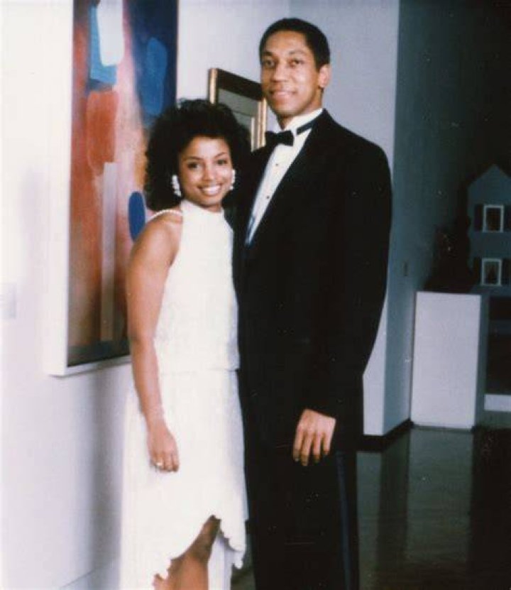 Judge Toler and her husband Eric Mumford posing in front of their home