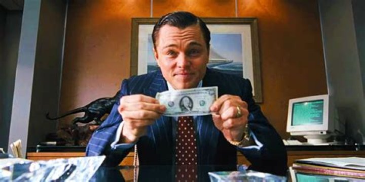Leonardo DiCaprio Shows Us The Money In New The Wolf Of Wall Street Stills