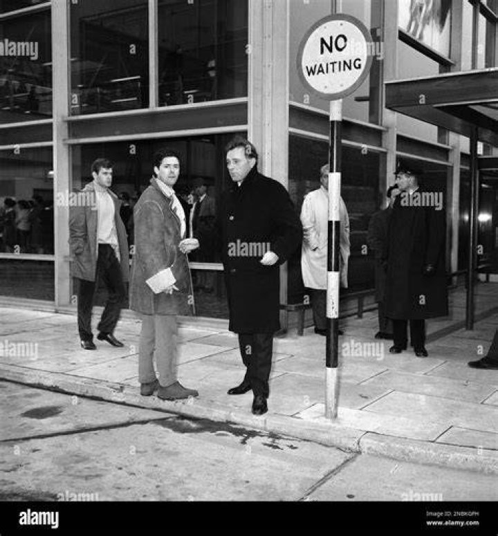 On March 20, 1963, David Thewlis Wheeler was born in Blackpool. David Wheeler is his given name; he is the son of Maureen and Alec Raymond Wheeler. Her parents were both employed by the business her father ran. He has an older brother in addition to being the younger of two brothers. He played lead guitar in the punk rock bands Door 66 and the rock band QED while still a teen. He attended Highfield High School in Blackpool's Marton neighborhood where he received his education. After that, he studied at the London Guildhall School of Music and Drama, where he received his degree in 1984.