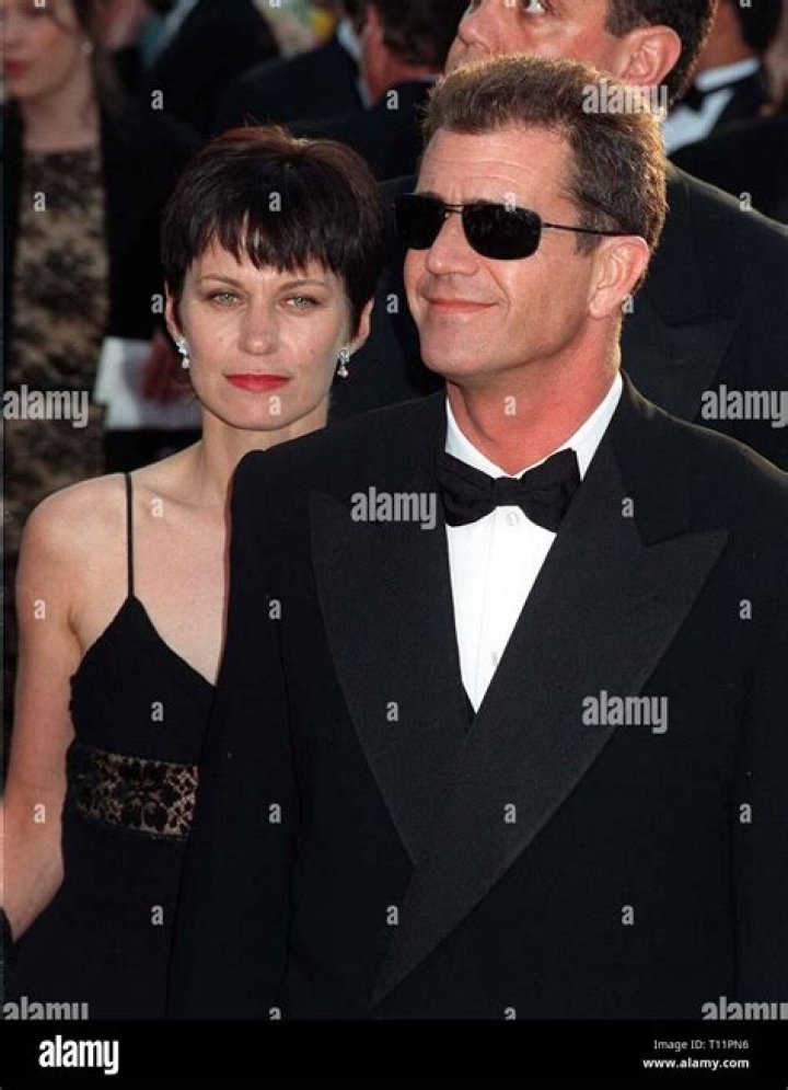 Robyn and Mel Gibson are standing together at an event. 