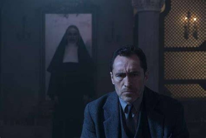 Valak stalking Father Burke in The Nun