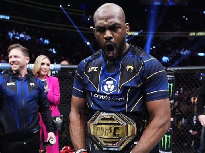When did UFC heavyweight champion Jon Jones win the belt?
