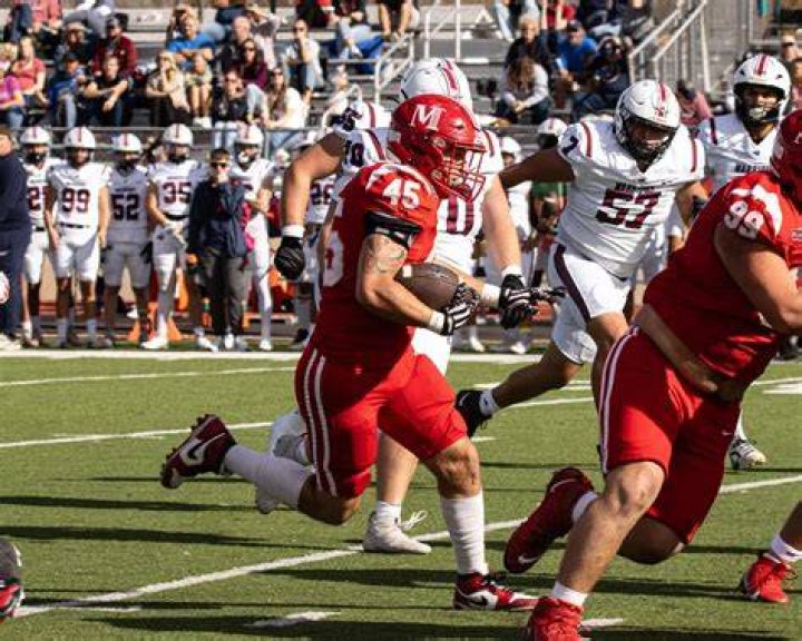 Where did Evan McPherson go to college? Did Evan McPherson play college football?